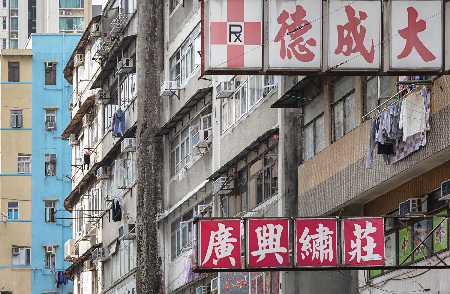 Hongkong, Wohnen, Reklameschilder